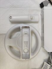 Nintendo Wii + Wii Wheel + Controller + AV Cable + Power supply