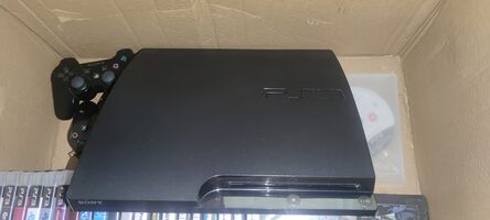 PlayStation 3 Slim, Black, 200GB su daug žaidimų