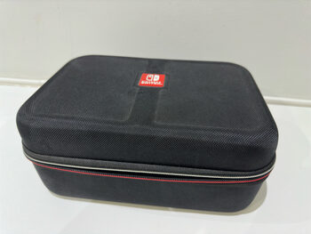 NINTENDO SWITCH + FUNDA DE TRANSPORTE