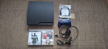 PS3 Slim 160GB + 2 žaidimai