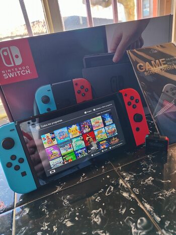 Nintendo switch v1 2017 + sd 512 GB con juegos 