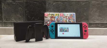 NINTENDO SWITCH + 2 JUEGOS for sale