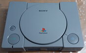 PlayStation PAL en caja + 3 juegos