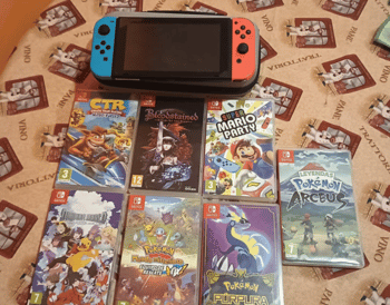 Nintendo Switch con caja+7 juegos + estuche