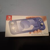 Buy Nintendo Switch Lite con Accesorios variados.