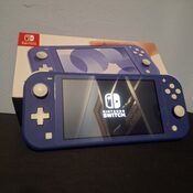 Nintendo Switch Lite con Accesorios variados.