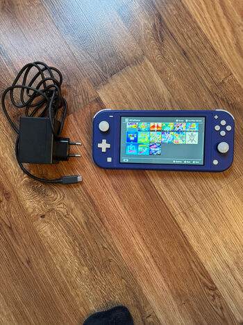 Nintendo Switch Lite + Zaidimai!