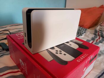 Get Nintendo Switch OLED, White, 64GB +Super Mario Bros. U Deluxe + dėklas 