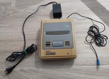 Super Nintendo original con adaptador de corriente 