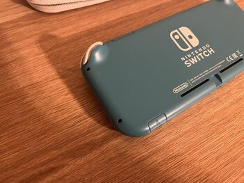 Nintendo Switch Lite, Turquoise, 32GB su žaidimu ir dėklu