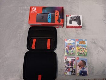 Nintendo Switch + Mando Pro + 4 Juegos + Accesorios.