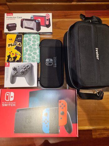 Get Nintendo Switch, Blue & Red, 32GB + accesorios + mando pro+ 30 juegos