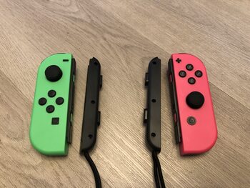 Žali/Rožiniai Nintendo Switch Joycon Pulteliai