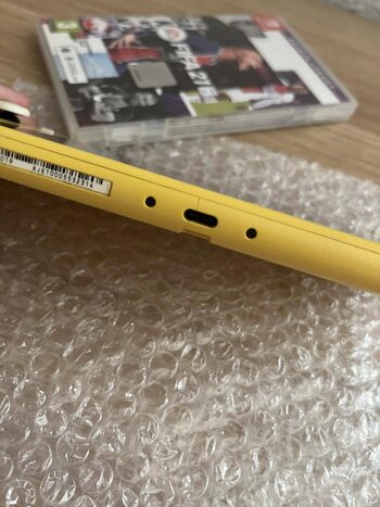 Nintendo Switch Lite, Yellow, 128GB su dėklu bei žaidimu